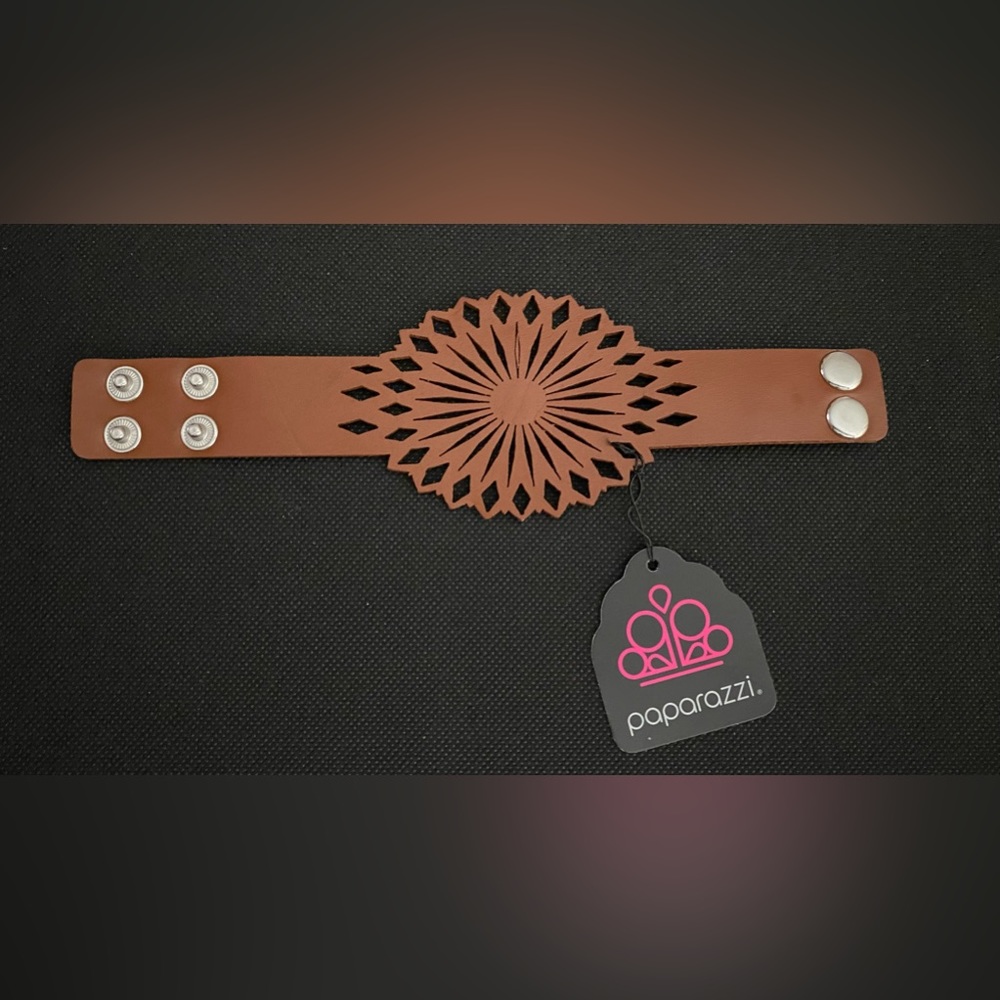 Thick brown flower pattern wrap bracelet.